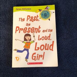 Scholastic White Cover Kids Book with Orange and Purple Accents
